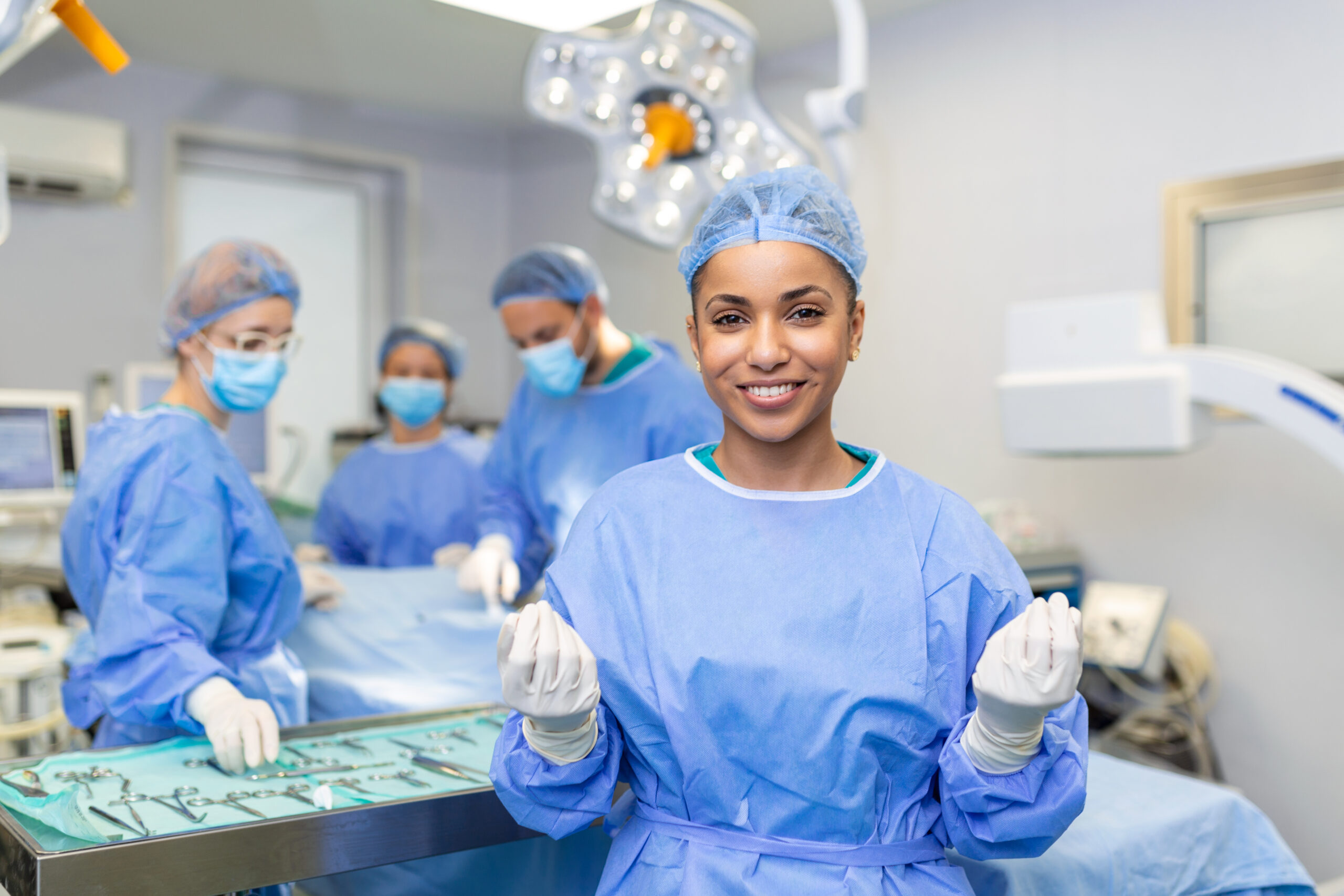 portrait surgeon standing operating room ready work patient african american female medical worker surgical uniform operation theater scaled