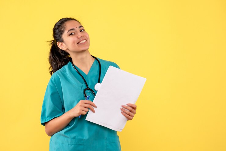 front view happy female doctor with documents yellow background 179666 29699